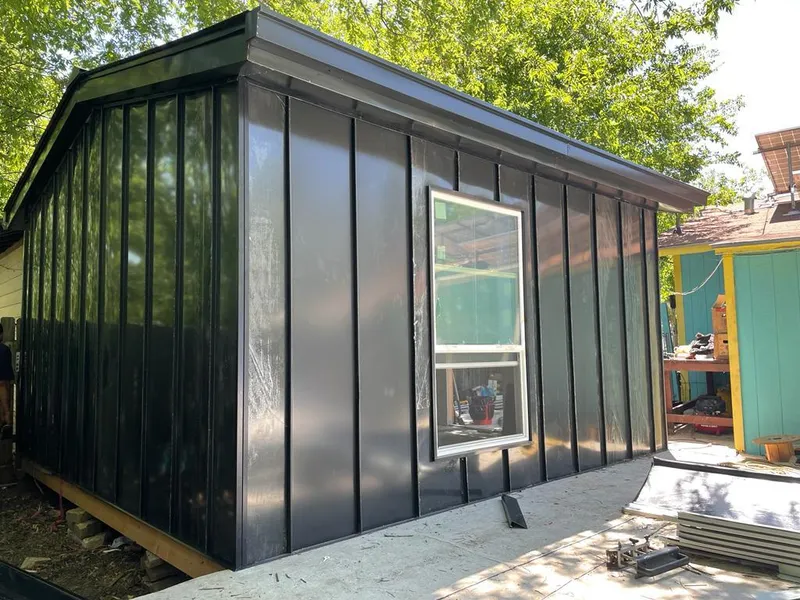 Black standing seam metal wall panels for Metal Roof Installation in Mayo